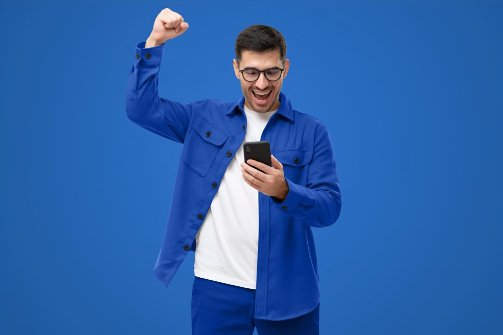 Image of a person reaching a mountain peak, symbolizing achieving goals quicker.